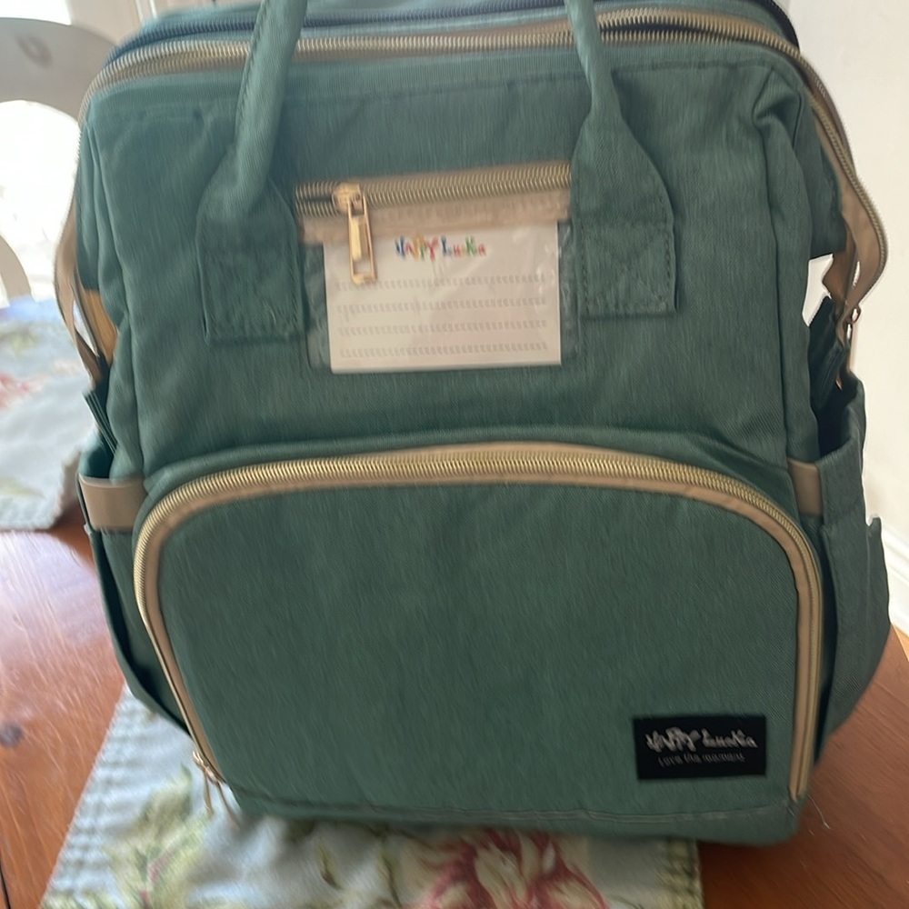 Diaper bag, backpack, sleeping cot all in one